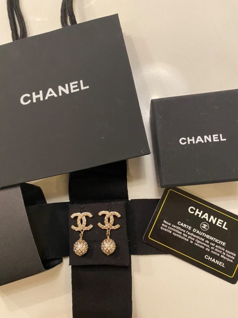 Chanel Earrings and their packaging from Vinted