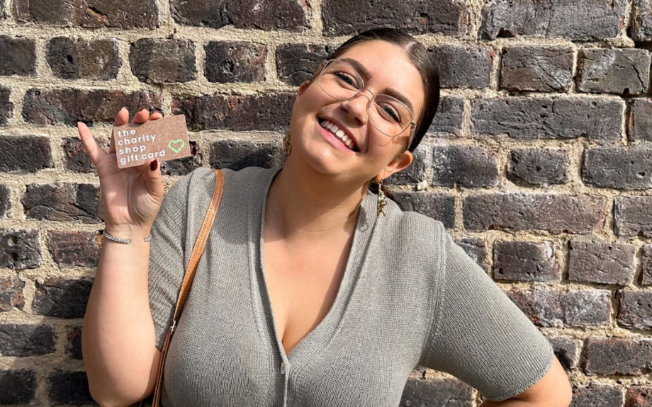 Amy with her charity shop gift card